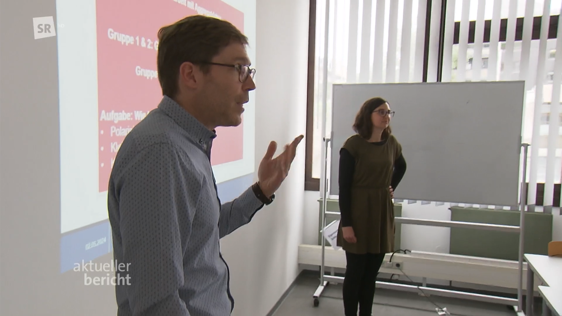 Prof. Dr. Georg Wenzelburger und Prof. Dr. Daniela Braun in der Sendung "aktueller Bericht" im SR-Fernsehen am 2. Mai 2024